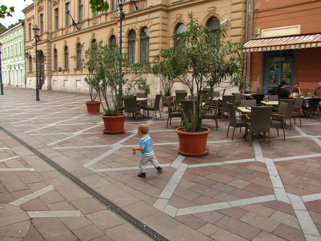 kid running away in public